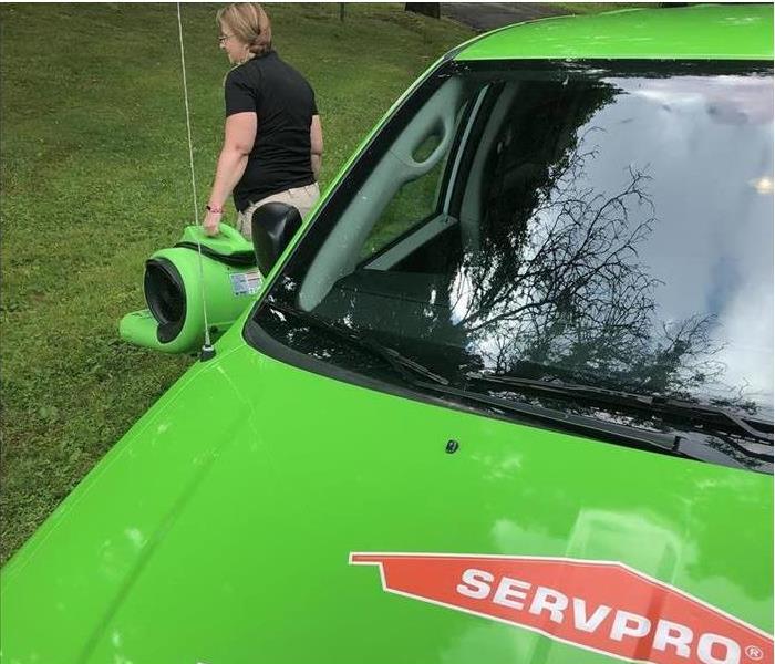 SERVPRO Worker with Car